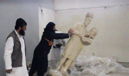 Isis fighters destroy ancient artefacts at Mosul museum 